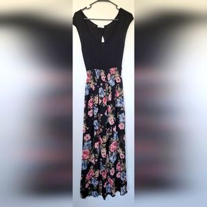 Rebellious Dreamer dress with black top and multi color floral sheer bottom.